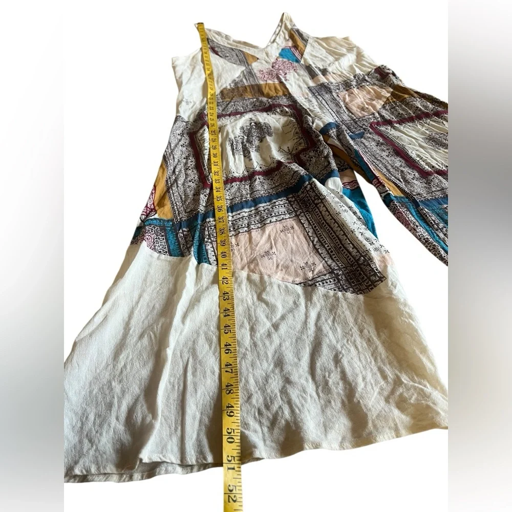 Free People Patchwork V-Neck Wide-Leg Jumpsuit in Cream, Blue, Mustard, Red - Picture 9 of 13